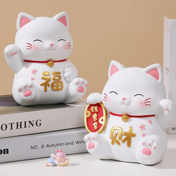 tirelire chat patte élégante
